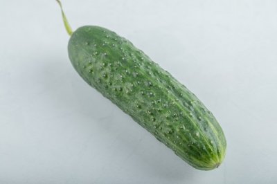 close-up-of-whole-fresh-green-cucumber-high-quality-photo_114579-35419.jpg